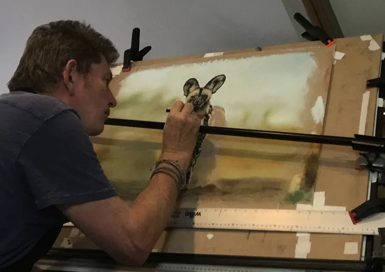 Simon working on his International Award winning sketch 'All Ears' at his Studio