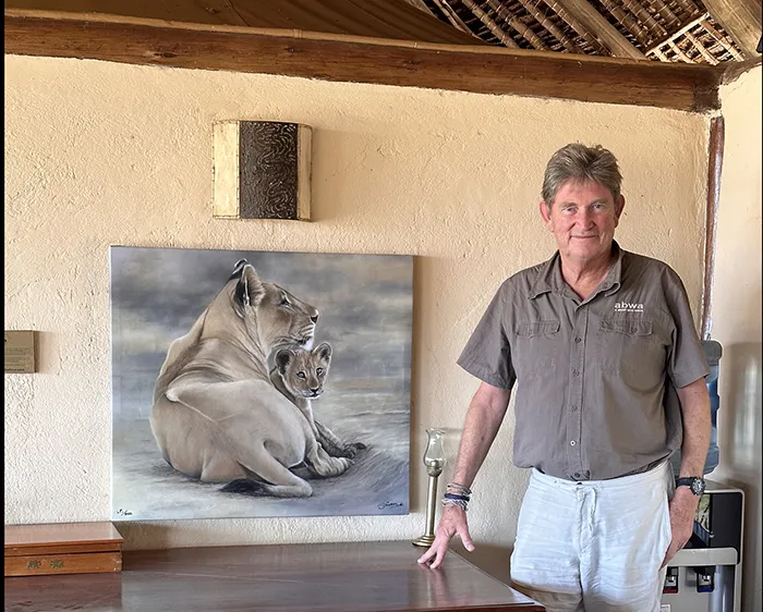 Simon with his lioness and cub sketch 'Mini Me' is also displayed at the lodge as a canvas