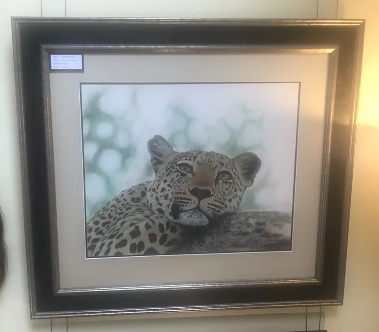 Framed with a double mount.